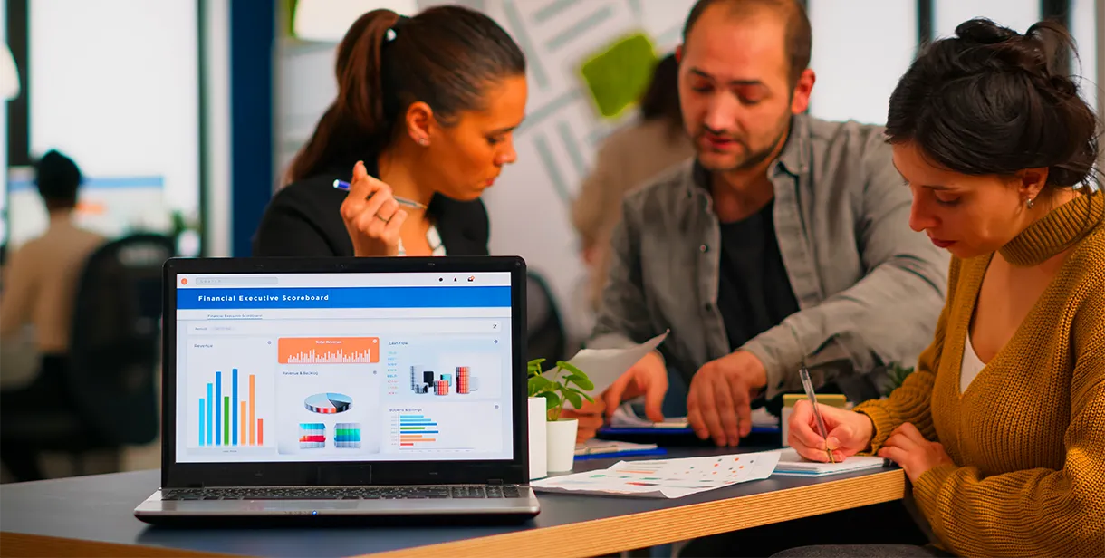 Team reviewing AI-driven performance marketing dashboards